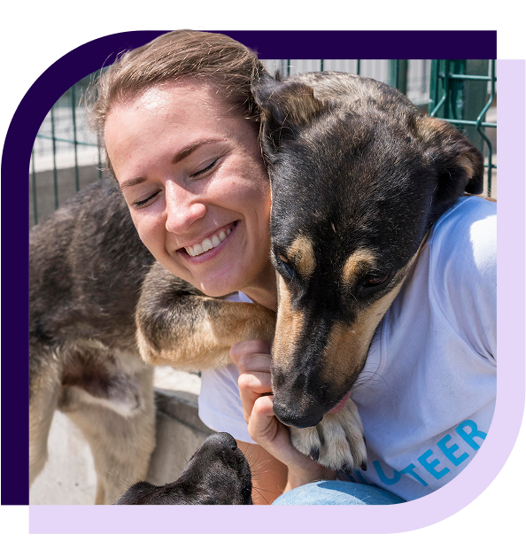 image of a woman hugging a dog