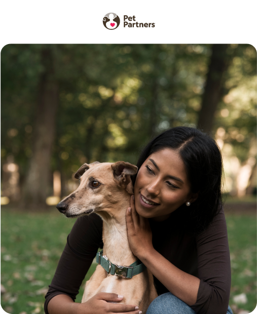 image of a woman hugging a dog from behind