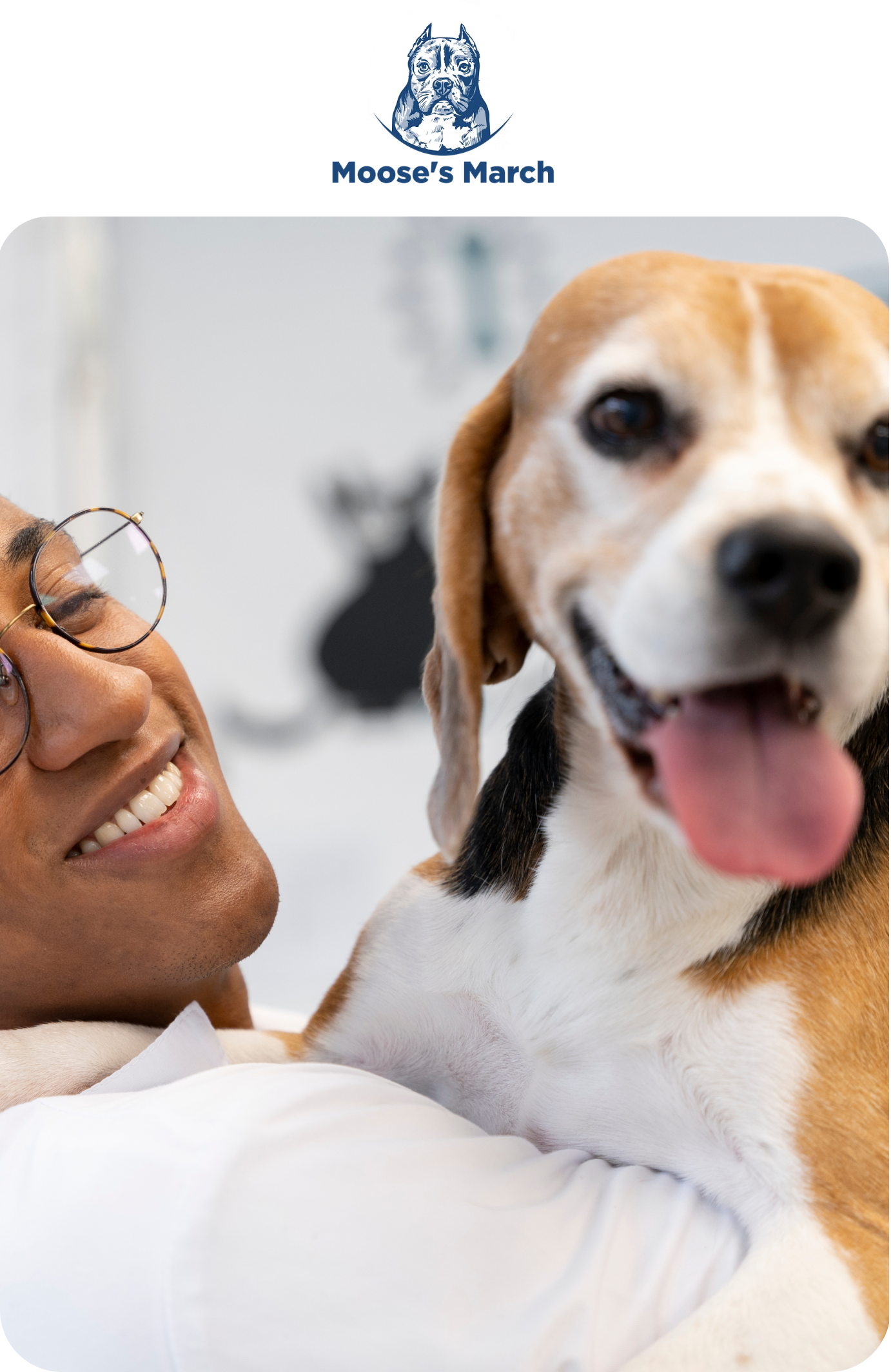 image of a vet holding a dog with moose's March on top